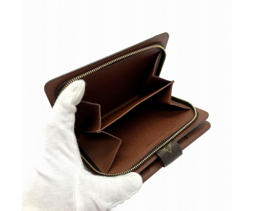 LOUIS VUITTON（ルイ ヴィトン）LOUIS VUITTON (ルイヴィトン) 2つ折り財布 ブラウン モノグラム M61207 SP0072の古着・服飾アイテム