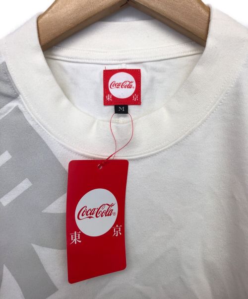 Coca Cola（コカコーラ）Coca Cola (コカコーラ) 長袖カットソー ホワイト サイズ:Mの古着・服飾アイテム