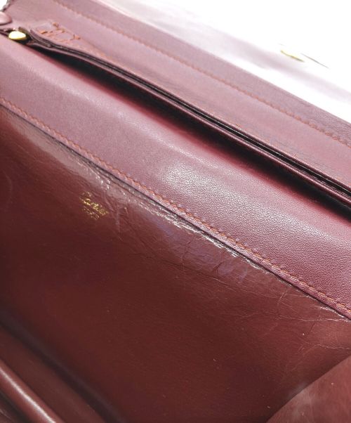 Cartier（カルティエ）Cartier (カルティエ) クラッチバッグ ボルドーの古着・服飾アイテム