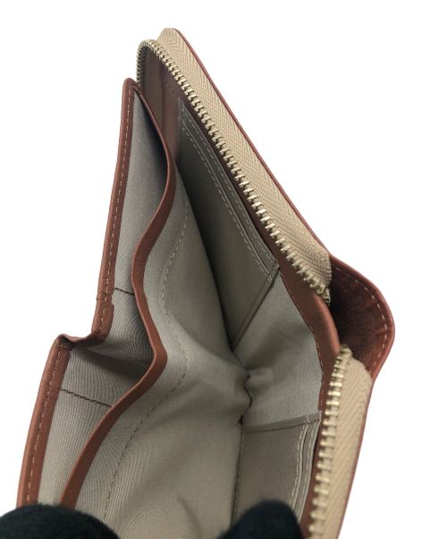 MARGARET HOWELL idea（マーガレット ハウエル アイディア）MARGARET HOWELL idea (マーガレット ハウエル アイディア) ラウンドファスナー財布 ブラウンの古着・服飾アイテム