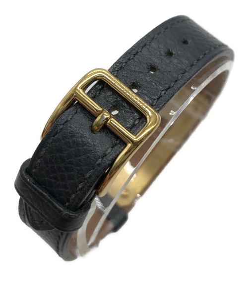 HERMES（エルメス）HERMES (エルメス) ケリーウォッチ　※時計動作不良　保証無し ブラック×ゴールド・文字盤ホワイトの古着・服飾アイテム