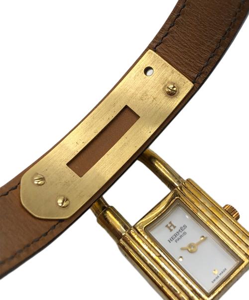 HERMES（エルメス）HERMES (エルメス) ケリーウォッチ　※時計動作不良　保証無し ブラック×ゴールド・文字盤ホワイトの古着・服飾アイテム