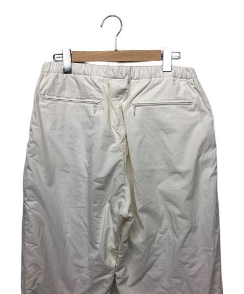 UMBRO（アンブロ）UMBRO (アンブロ) COMOLI (コモリ) ナイロンパンツ ホワイト サイズ:Lの古着・服飾アイテム