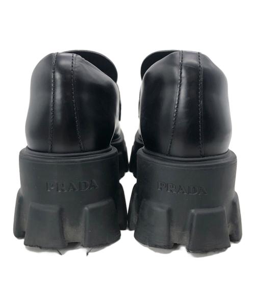 PRADA（プラダ）PRADA (プラダ) ブラッシュドレザーモノリスローファー ブラック サイズ:36 1/2の古着・服飾アイテム
