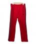 Needles（ニードルズ）の古着「トラックパンツ」｜レッド