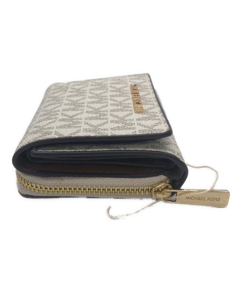 MICHAEL KORS（マイケル・コース）MICHAEL KORS (マイケルコース) 3つ折り財布 ベージュ 未使用品の古着・服飾アイテム