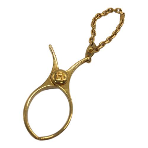 HERMES（エルメス）HERMES (エルメス) グローブホルダー ゴールドカラーの古着・服飾アイテム