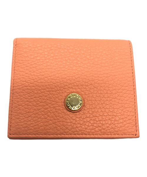 IACUCCI（イアクッチ）IACUCCI (イアクッチ) 2つ折り財布 オレンジの古着・服飾アイテム
