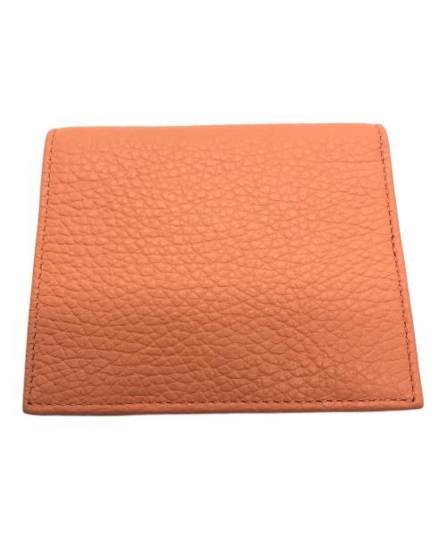 IACUCCI（イアクッチ）IACUCCI (イアクッチ) 2つ折り財布 オレンジの古着・服飾アイテム