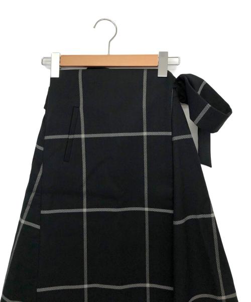 Mila Owen（ミラオーウェン）Mila Owen (ミラオーウェン) ウエストリボンラップデザインスカート ブラックの古着・服飾アイテム