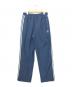 adidas（アディダス）の古着「ウーブンパンツ」｜ブルー