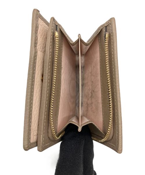 GUCCI（グッチ）GUCCI (グッチ) 2つ折り財布 ベージュの古着・服飾アイテム