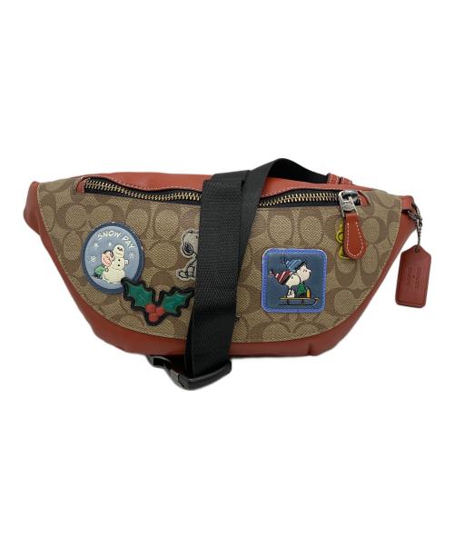 COACH（コーチ）COACH (コーチ) PEANUTS (ピーナッツ) ボディーバッグの古着・服飾アイテム