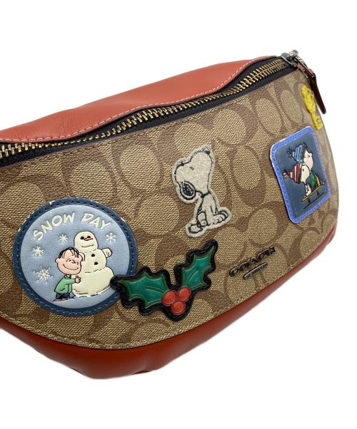 COACH（コーチ）COACH (コーチ) PEANUTS (ピーナッツ) ボディーバッグの古着・服飾アイテム