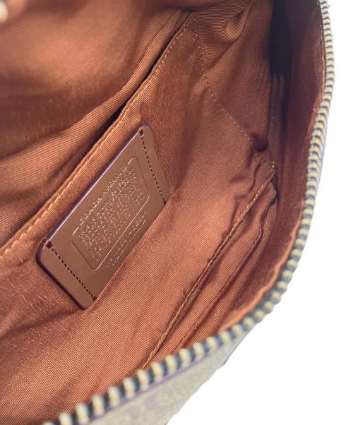 COACH（コーチ）COACH (コーチ) PEANUTS (ピーナッツ) ボディーバッグの古着・服飾アイテム