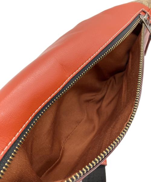 COACH（コーチ）COACH (コーチ) PEANUTS (ピーナッツ) ボディーバッグの古着・服飾アイテム