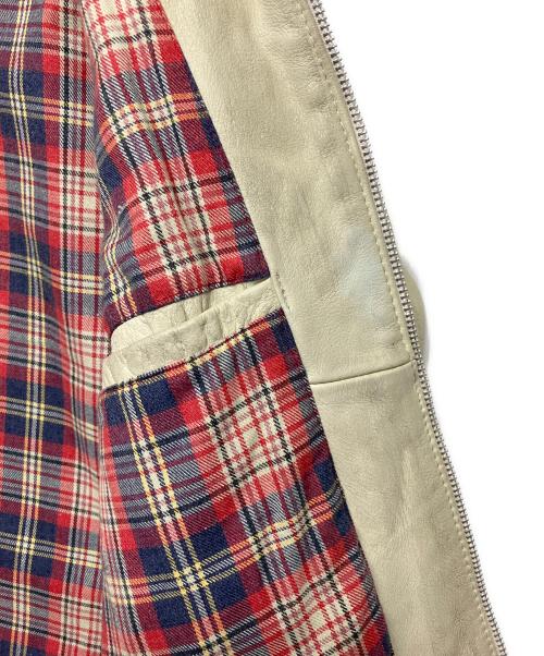 Schott（ショット）Schott (ショット) シングルライダースジャケット 星条旗柄 ベージュ×グリーン サイズ:Mの古着・服飾アイテム