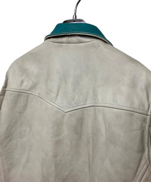 Schott（ショット）Schott (ショット) シングルライダースジャケット 星条旗柄 ベージュ×グリーン サイズ:Mの古着・服飾アイテム