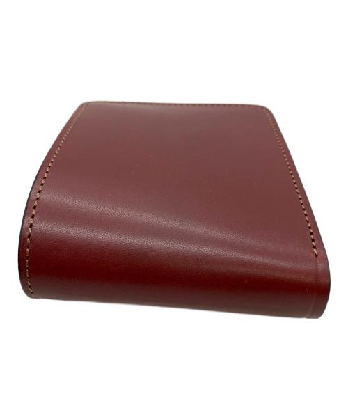 WILDSWANS（ワイルドスワンズ）WILDSWANS (ワイルドスワンズ) 2つ折り財布 レッドの古着・服飾アイテム