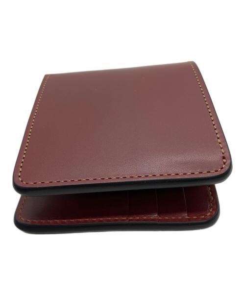 WILDSWANS（ワイルドスワンズ）WILDSWANS (ワイルドスワンズ) 2つ折り財布 レッドの古着・服飾アイテム