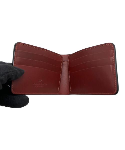 WILDSWANS（ワイルドスワンズ）WILDSWANS (ワイルドスワンズ) 2つ折り財布 レッドの古着・服飾アイテム