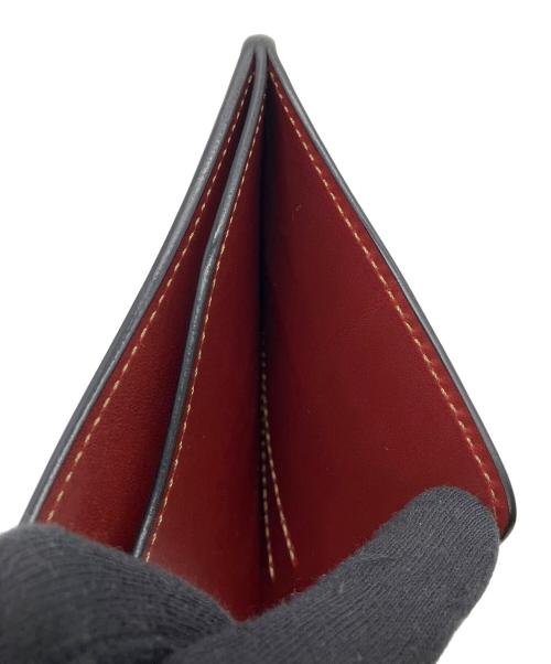 WILDSWANS（ワイルドスワンズ）WILDSWANS (ワイルドスワンズ) 2つ折り財布 レッドの古着・服飾アイテム