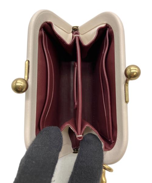 COACH（コーチ）COACH (コーチ) がま口ポーチの古着・服飾アイテム