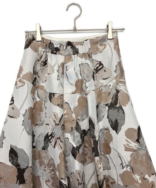 JUSGLITTY（ジャスグリッティー）JUSGLITTY (ジャスグリッティー) フレアスカート アイボリーの古着・服飾アイテム