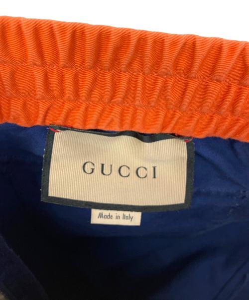 GUCCI（グッチ）GUCCI (グッチ) サイドラインパンツ ブルー×オレンジ サイズ:46の古着・服飾アイテム