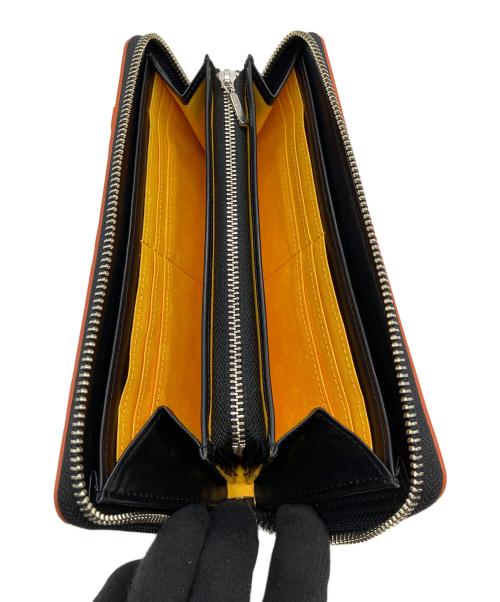 CASTELBAJAC（カステルバジャック）CASTELBAJAC (カステルバジャック) 長財布 オレンジの古着・服飾アイテム