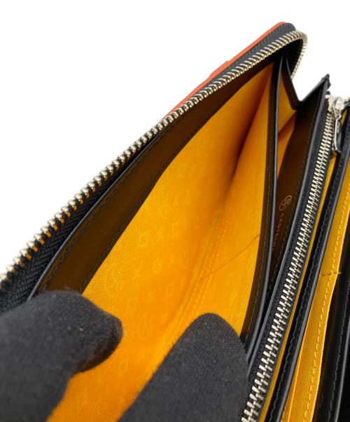 CASTELBAJAC（カステルバジャック）CASTELBAJAC (カステルバジャック) 長財布 オレンジの古着・服飾アイテム