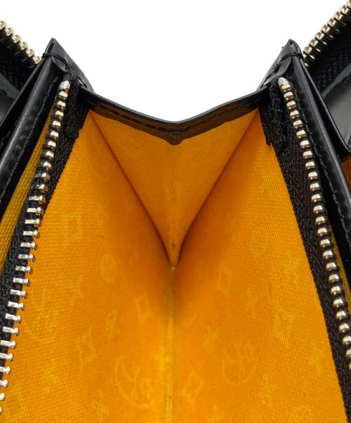 CASTELBAJAC（カステルバジャック）CASTELBAJAC (カステルバジャック) 長財布 オレンジの古着・服飾アイテム