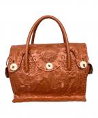 GRACE CONTINENTAL（グレースコンチネンタル）の古着「CARVING TRIBES」｜ブラウン