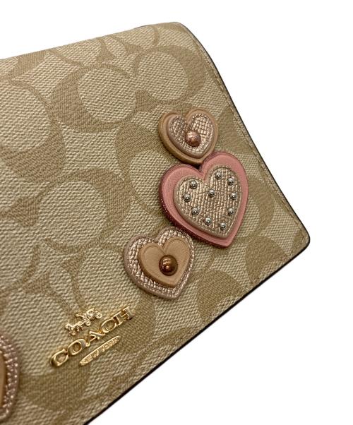 COACH（コーチ）COACH (コーチ) ショルダーバッグ アイボリー×ピンクの古着・服飾アイテム