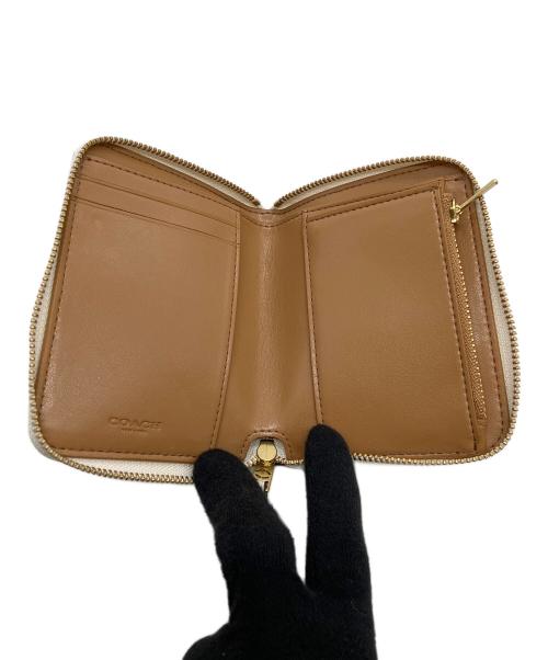 COACH（コーチ）COACH (コーチ) 2つ折り財布 アイボリー 未使用品の古着・服飾アイテム