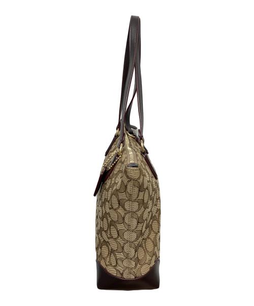 COACH（コーチ）COACH (コーチ) エンボスシグネチャー　ハンドバッグ ブラウンの古着・服飾アイテム
