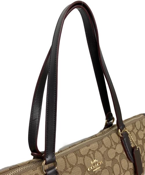 COACH（コーチ）COACH (コーチ) エンボスシグネチャー　ハンドバッグ ブラウンの古着・服飾アイテム