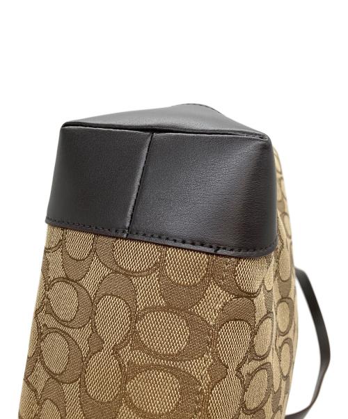 COACH（コーチ）COACH (コーチ) エンボスシグネチャー　ハンドバッグ ブラウンの古着・服飾アイテム