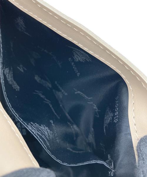 discord Yohji Yamamoto（ディスコード ヨウジヤマモト）discord Yohji Yamamoto (ディスコード ヨウジヤマモト) Mini AERIAL HAND アイボリーの古着・服飾アイテム