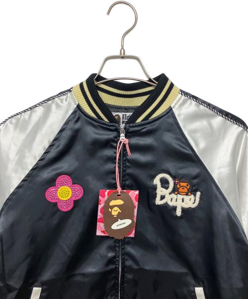 A BATHING APE（アベイシングエイプ）A BATHING APE (ア ベイシング エイプ) CRYSTAL STONE BABY LISA SOUVENIR JACKET ブラック サイズ:M 未使用品の古着・服飾アイテム