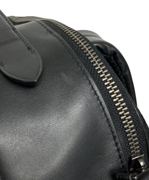 COACH（コーチ）COACH (コーチ) シグネチャー ヴァーシティ グラハム バックパック ネイビー×ブラックの古着・服飾アイテム