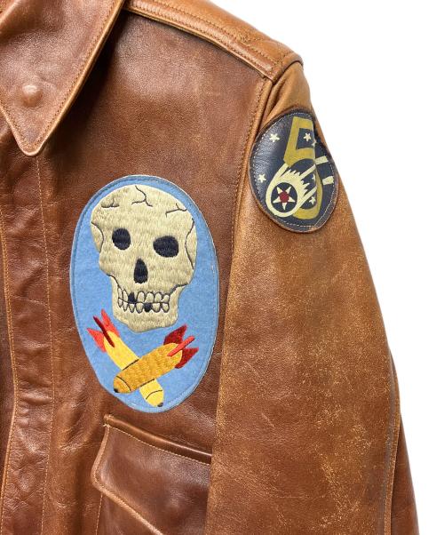 BUZZ RICKSON'S（バズリクソンズ）BUZZ RICKSON'S (バズリクソンズ) A-2フライトジャケット 90th BG Jolly Rogers 古着 スカル ブラウン サイズ:36の古着・服飾アイテム