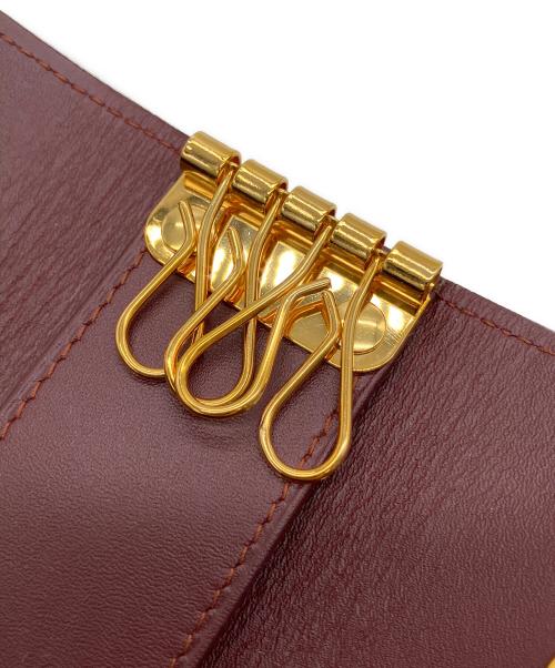 Cartier（カルティエ）Cartier (カルティエ) 4連キーケース ボルドーの古着・服飾アイテム