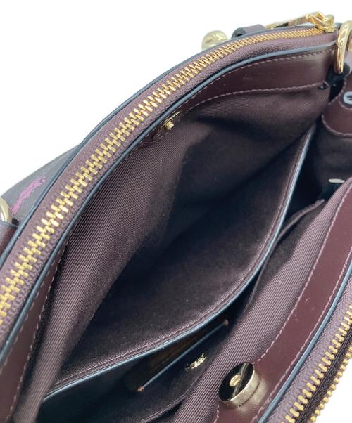 COACH（コーチ）COACH (コーチ) 2WAYバッグ※ストラップ欠品 パープルの古着・服飾アイテム