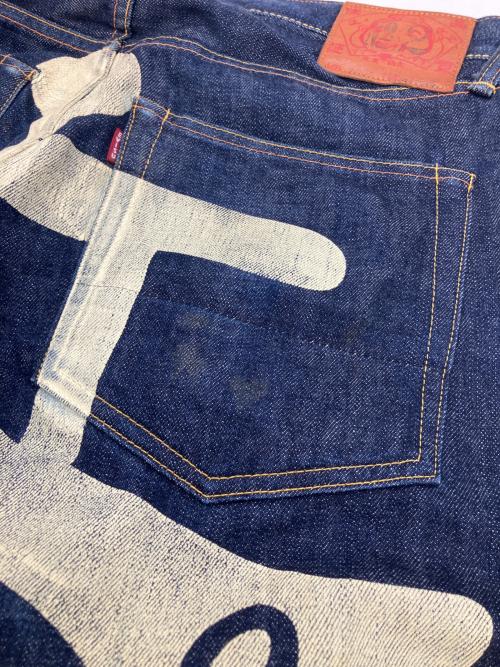 EVISU（エヴィス）EVISU (エヴィス) 2001　ビッグ音ペイントデニムパンツ インディゴ サイズ:86cm (W34)の古着・服飾アイテム