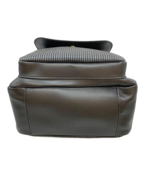 M U SPORTS（エムユースポーツ）M U SPORTS (エムユースポーツ) デュアルレザービジューロイヤルバックパック ブラックの古着・服飾アイテム