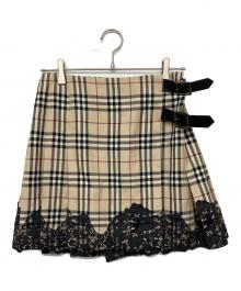 BURBERRY LONDON（バーバリーロンドン）の古着「ノバチェックラップスカート」｜ベージュ