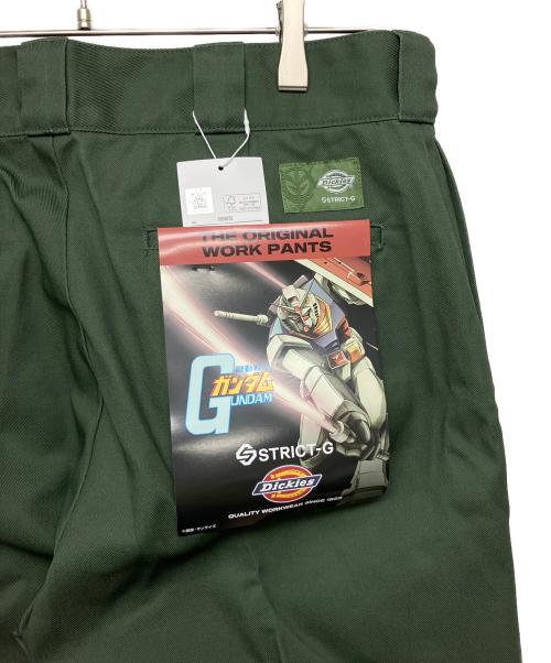 Dickies（ディッキーズ）Dickies (ディッキーズ) ガンダム (ガンダム) 『機動戦士ガンダム』WORK PANTS 地球連邦軍　チノパン カーキ サイズ:86cm (W34) 未使用品の古着・服飾アイテム