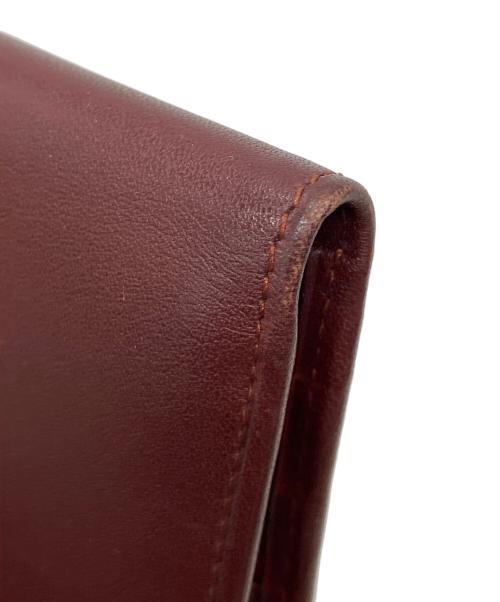 Cartier（カルティエ）Cartier (カルティエ) マストライン 2つ折り財布 レッドの古着・服飾アイテム