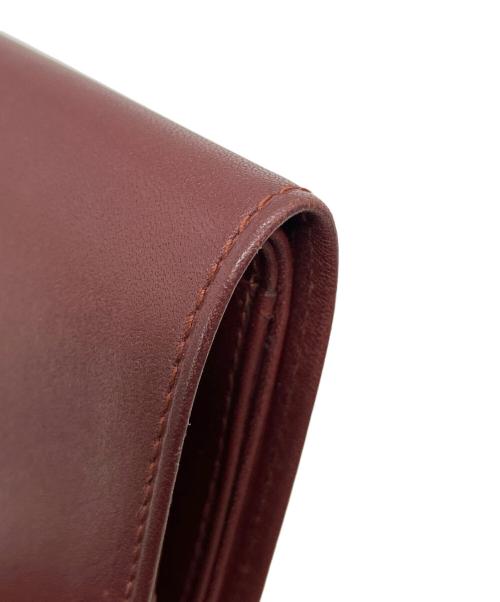 Cartier（カルティエ）Cartier (カルティエ) マストライン 2つ折り財布 レッドの古着・服飾アイテム